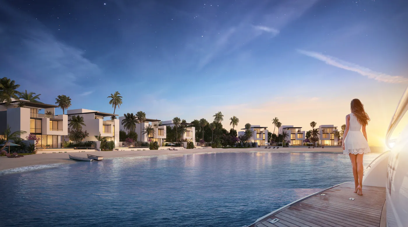 Villas on the shoreline at Sun Island at sunset