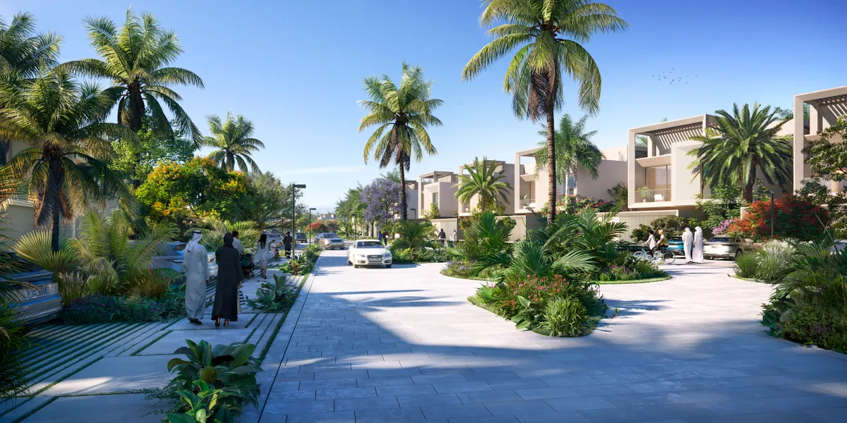 A shaded residential street inside the community